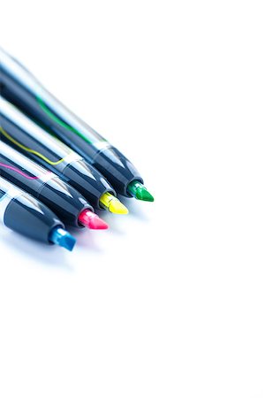 dbvirago (artist) - Tips of four colored highlighter pens on a white background Fotografie stock - Microstock e Abbonamento, Codice: 400-06750464