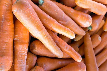 simsearch:400-06750784,k - Carrots at Southeast Asia Outdoor Wet Market with Natural Lighting Closeup Background Photographie de stock - Aubaine LD & Abonnement, Code: 400-06750675