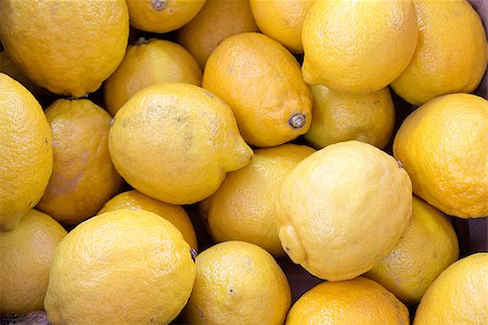 simsearch:400-06750784,k - Yellow Lemons Citrus Fruits Closeup Background Photographie de stock - Aubaine LD & Abonnement, Code: 400-06750678