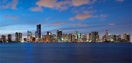 Miami Skyline seen from Key Biscayne at dusk Stock Photo - Budget Royalty-Free & Subscription, Code: 400-06751091