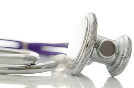 Closeup of a stethoscope isolated on a white background. Stockbilder - Microstock & Abonnement, Bildnummer: 400-06751354