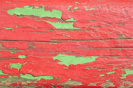 Detail of old wooden boards painted in red and green with several layers of shelled paint Stock Photo - Budget Royalty-Free & Subscription, Code: 400-06751395