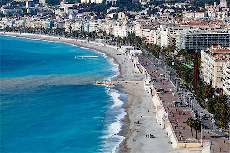 Promenade des Anglais and Beautiful Beach in Nice, French Riviera, France Foto de stock - Royalty-Free Super Valor e Assinatura, Número: 400-06751611