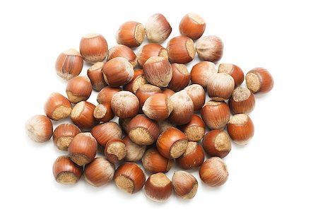 simsearch:400-07210943,k - A handful of hazelnuts, isolated on white background Stock Photo - Budget Royalty-Free & Subscription, Code: 400-06751846
