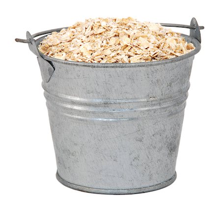 simsearch:400-06791326,k - Porridge oats in a miniature metal bucket, isolated on a white background Stock Photo - Budget Royalty-Free & Subscription, Code: 400-06751916