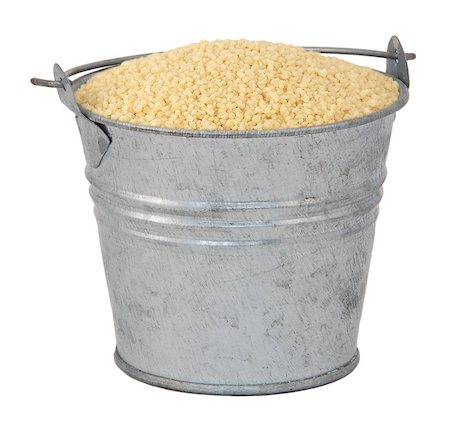 simsearch:400-06788551,k - Cous cous in a miniature metal bucket, isolated on a white background Foto de stock - Super Valor sin royalties y Suscripción, Código: 400-06751913