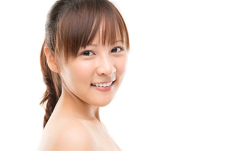 Close up of Asian young woman face with happy smile. skincare concept. Stock Photo - Budget Royalty-Free & Subscription, Code: 400-06752017