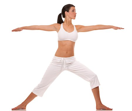 pretty brunette is exercising yoga on white background Photographie de stock - Aubaine LD & Abonnement, Code: 400-06765349