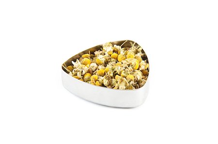 dry cured - Chamomile tea in a metal container Stock Photo - Budget Royalty-Free & Subscription, Code: 400-06766294