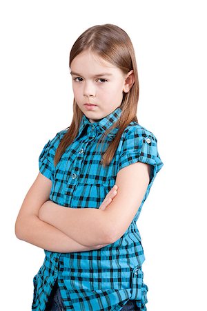 Angry young girl, isolated on white background, in blue modern checkered shirt, with arms crossed Stock Photo - Budget Royalty-Free & Subscription, Code: 400-06766447