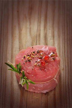 Fresh meat with spices, olive oil  and herbs for grill. Old style. Stock Photo - Budget Royalty-Free & Subscription, Code: 400-06767712