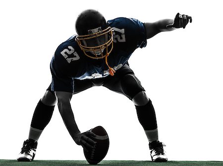 one center  american football player man in silhouette studio isolated on white background Foto de stock - Super Valor sin royalties y Suscripción, Código: 400-06768288