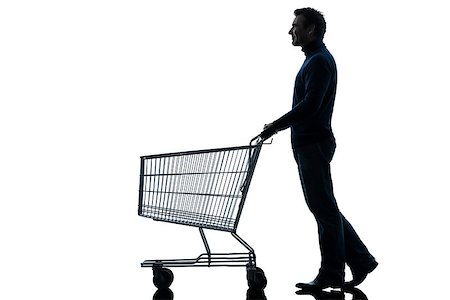 one caucasian man with empty shopping cart in silhouette studio isolated on white background Stock Photo - Budget Royalty-Free & Subscription, Code: 400-06768343