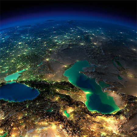 simsearch:400-06363454,k - Highly detailed Earth, illuminated by moonlight. The glow of cities sheds light on the detailed exaggerated terrain and translucent water of the oceans. Elements of this image furnished by NASA Photographie de stock - Aubaine LD & Abonnement, Code: 400-06768357