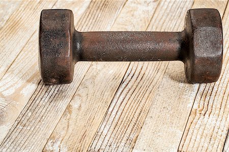 simsearch:400-07620929,k - vintage iron rusty dumbbells on weathered white painted barn wood background - fitness concept Stock Photo - Budget Royalty-Free & Subscription, Code: 400-06768456