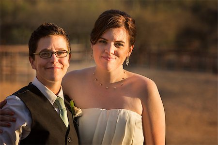 Smiling same sex couple at civil union Stock Photo - Budget Royalty-Free & Subscription, Code: 400-06768967