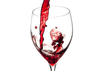 simsearch:400-04264239,k - Splash of a red wine isolated on a white background. Stock Photo - Budget Royalty-Free & Subscription, Code: 400-06769548