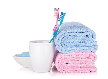 simsearch:400-04789848,k - Toothbrushes, soap and two towels. Isolated on white background Stock Photo - Budget Royalty-Free & Subscription, Code: 400-06769725