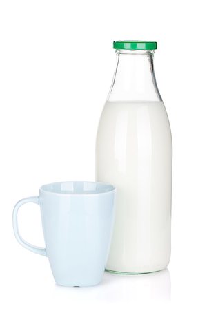 simsearch:400-04499805,k - Cup of milk and glass bottle. Isolated on white background Photographie de stock - Aubaine LD & Abonnement, Code: 400-06769740