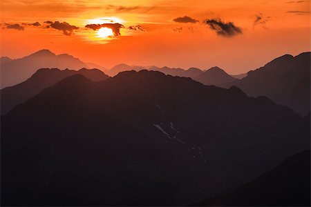 simsearch:400-07302061,k - Sunset over the Fagaras Mountains, Romania. View from Moldoveanu Peak  2544m. Foto de stock - Royalty-Free Super Valor e Assinatura, Número: 400-06769788