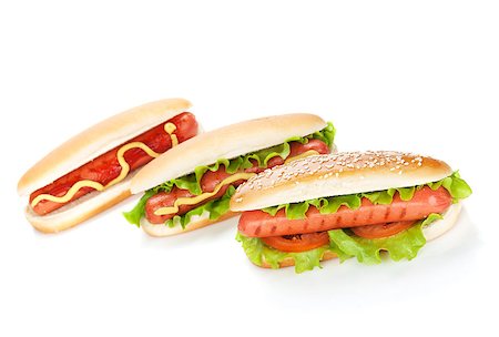 simsearch:400-04290264,k - Three hot dogs with various ingredients. Isolated on white background Stockbilder - Microstock & Abonnement, Bildnummer: 400-06769862