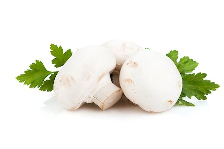 simsearch:400-07430898,k - Champignon mushrooms with herbs. Isolated on white background Photographie de stock - Aubaine LD & Abonnement, Code: 400-06769863