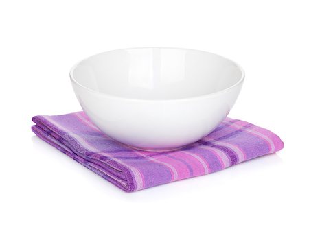 simsearch:400-04799995,k - Salad bowl over kitchen towel. Isolated on white background Stock Photo - Budget Royalty-Free & Subscription, Code: 400-06769877