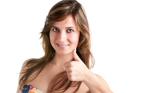 simsearch:400-06769983,k - Attractive young woman giving the thumbs-up, isolated on a white background Foto de stock - Royalty-Free Super Valor e Assinatura, Número: 400-06769937