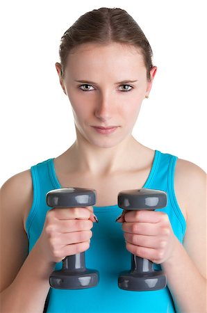 simsearch:400-06480028,k - Woman working out with dumbbells at a gym, isolated in a white background Stock Photo - Budget Royalty-Free & Subscription, Code: 400-06769946