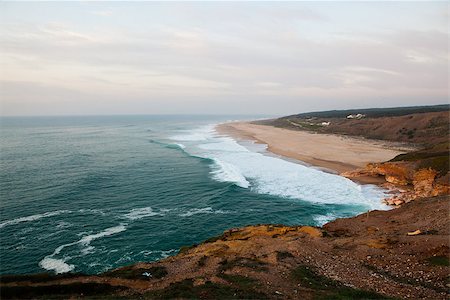 Scenic view of surf beach and ocean near Nazare Portugal Foto de stock - Super Valor sin royalties y Suscripción, Código: 400-06760579