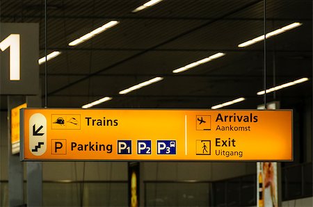 Information sign in Schiphol airport in Amsterdam, Nederlands written in English and Dutch Stock Photo - Budget Royalty-Free & Subscription, Code: 400-06760910