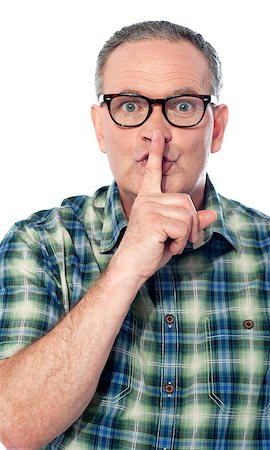 simsearch:400-08349890,k - Cropped image of handsome old man with finger on his lips. Silence concept Stock Photo - Budget Royalty-Free & Subscription, Code: 400-06760994