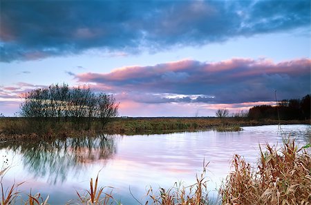 simsearch:400-07046539,k - dramatic sky during sunrise over small wild pond Stock Photo - Budget Royalty-Free & Subscription, Code: 400-06761101