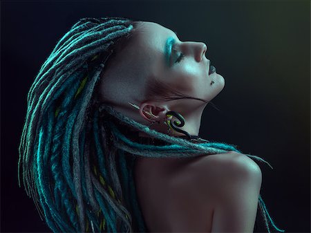 dreads teen - Pretty girl with dreadlocks posing in studio Stock Photo - Budget Royalty-Free & Subscription, Code: 400-06761148