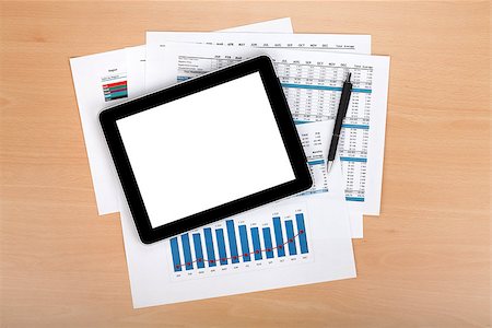 simsearch:400-08530598,k - Tablet with blank screen over papers with numbers and charts. View from above Stock Photo - Budget Royalty-Free & Subscription, Code: 400-06761608