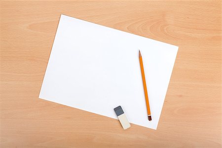 simsearch:400-08378888,k - Blank paper with pen and eraser on wood table Stock Photo - Budget Royalty-Free & Subscription, Code: 400-06761700