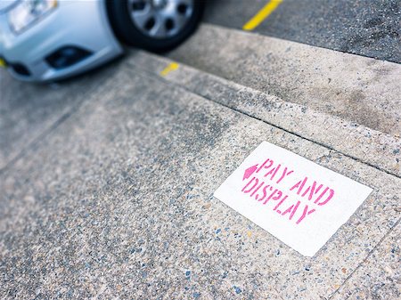 An image of a parking place with the sign "pay and display" Stock Photo - Budget Royalty-Free & Subscription, Code: 400-06763800