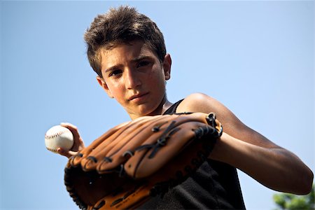 simsearch:400-04067347,k - Sport, baseball and kids, portrait of child with glove holding ball and looking at camera Foto de stock - Super Valor sin royalties y Suscripción, Código: 400-06770214