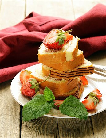 rolled biscuit - roulade cake with cream and strawberries Stock Photo - Budget Royalty-Free & Subscription, Code: 400-06770234