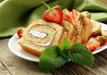 rolled biscuit - roulade cake with cream and strawberries Stock Photo - Budget Royalty-Free & Subscription, Code: 400-06770641