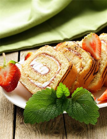 rolled biscuit - roulade cake with cream and fresh strawberries Stock Photo - Budget Royalty-Free & Subscription, Code: 400-06770780