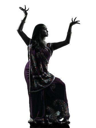 simsearch:400-06748271,k - one indian woman dancer dancing in silhouette studio isolated on white background Stockbilder - Microstock & Abonnement, Bildnummer: 400-06770996