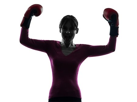 one caucasian woman with boxing gloves  in silhouette studio isolated on white background Stock Photo - Budget Royalty-Free & Subscription, Code: 400-06771009