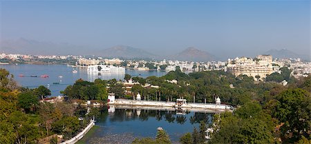 simsearch:851-02960522,k - Udaipur. View of Lake Pichola, City Palace and Taj Lake Palace. Panorama. Udaipur, Rajasthan, India, Asia. Foto de stock - Super Valor sin royalties y Suscripción, Código: 400-06771120