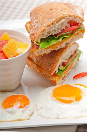 simsearch:400-06641159,k - fresh ciabatta panini sandwich with eggs tomato lettuce Foto de stock - Super Valor sin royalties y Suscripción, Código: 400-06771135