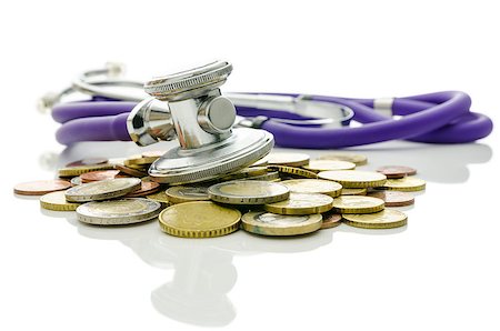 simsearch:400-06860365,k - Concept of financial crisis recovery. Stethoscope on euro coins representing help and hope for the market. Stock Photo - Budget Royalty-Free & Subscription, Code: 400-06771507