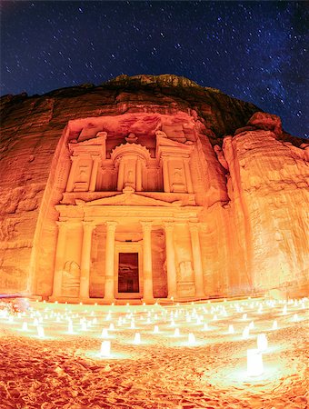 famous desert mountains - Night show at Petra. Long exposure fisheye image showing Al Khazneh by candlelight and starry sky Stock Photo - Budget Royalty-Free & Subscription, Code: 400-06771915