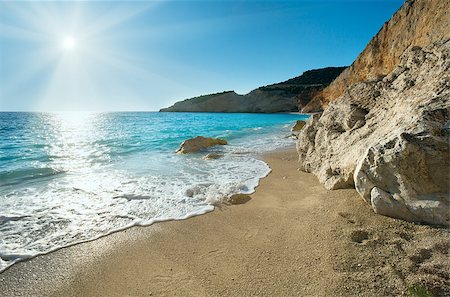 Beautiful summer white Porto Katsiki beach on Ionian Sea (Lefkada, Greece) with sun in sky Stock Photo - Budget Royalty-Free & Subscription, Code: 400-06772046