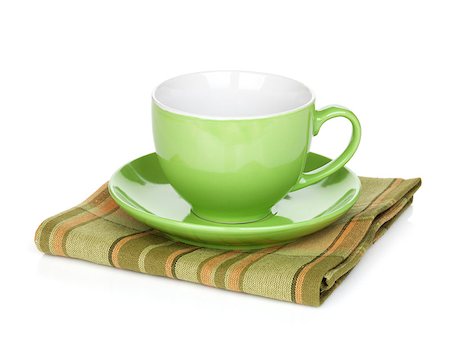 simsearch:400-04799995,k - Coffee cup over kitchen towel. Isolated on white background Stock Photo - Budget Royalty-Free & Subscription, Code: 400-06772218