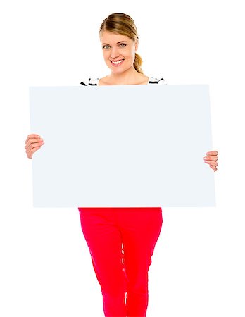 simsearch:400-06695536,k - Pretty lady displaying blank placard against white background Stock Photo - Budget Royalty-Free & Subscription, Code: 400-06772627